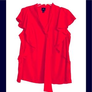NWOT. Red ruffle scarf tie blouse . Ruffle sleeves and down sides.